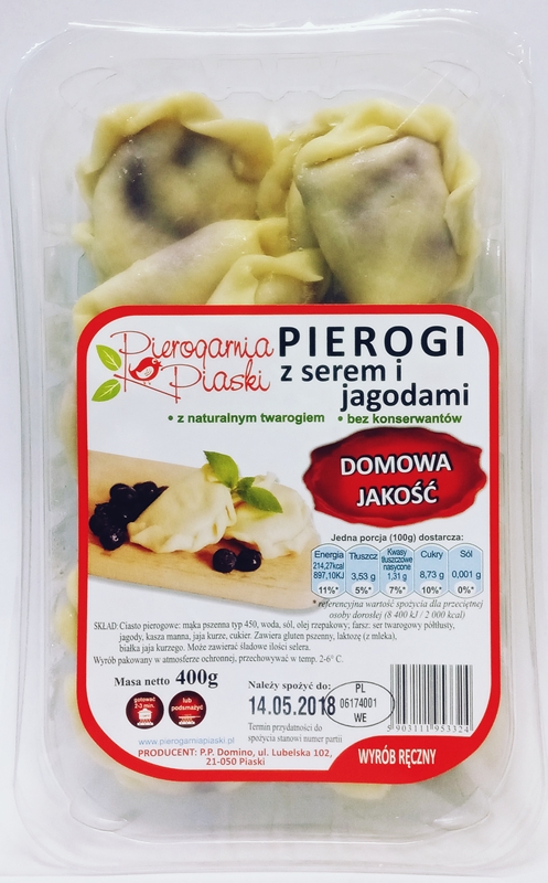 Pierogarnia Piands Dumplings with cheese and blueberries. Hand-made